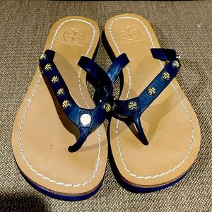 Tory Burch navy with gold logos along strap thong sandals